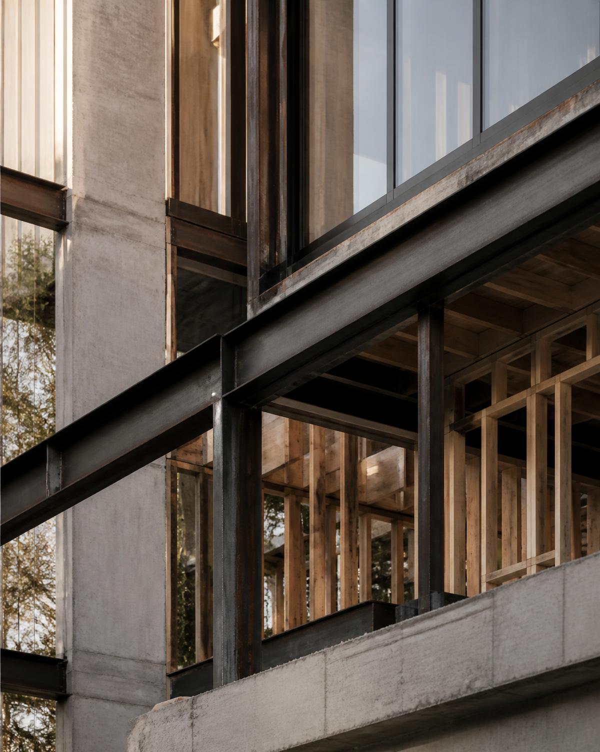 Exposed concrete, steel and timber structure of a Tillery build